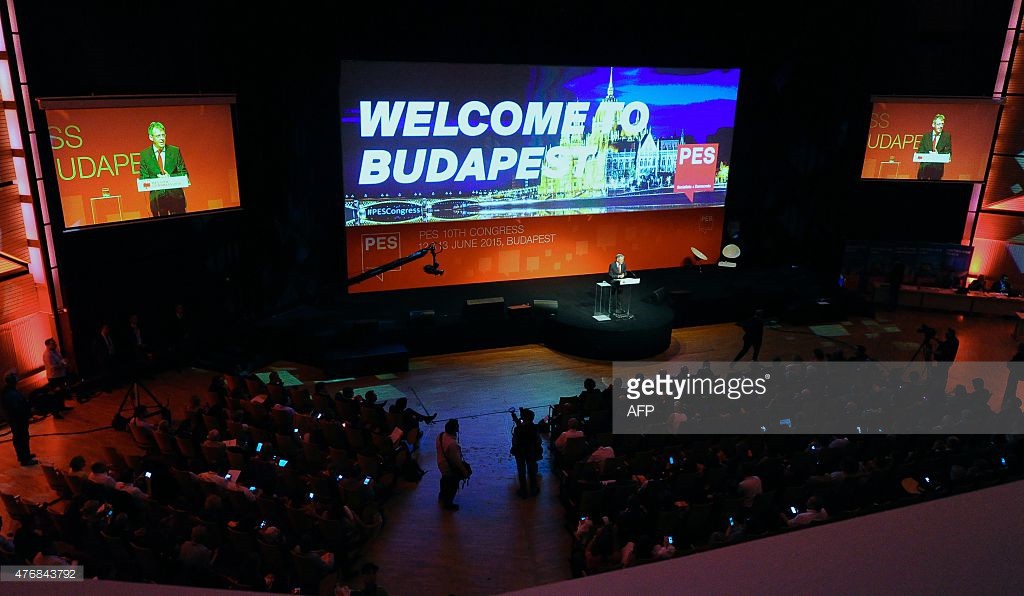 PES Secretary General Achim Post welcomes the participants of the 10th congress of Party of European Socialists (PES) in Budapest on June 12, 2015 during the first plenary session of their two-day meeting. The president will be elected by the representatives of the congress.  AFP PHOTO / ATTILA KISBENEDEK