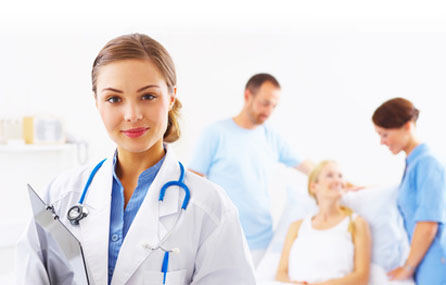 Portrait of a doctor with two of her co-workers talking with a patient in the background