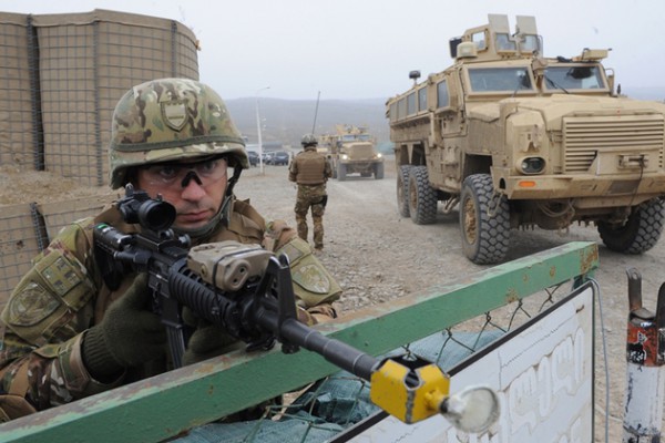 A Georgian serviceman guards an area during a military drill at a base near the town of Gardabani, south of Tbilisi, on January 23, 2015. According to Georgia's Defense Ministry, servicemen from the 43rd battalion of the IV mechanized brigade of the Georgian Armed Forces are conducting a six month course to take over from another Georgian unit participating in the International Security Assistance Force (ISAF), NATO military operation in Afghanistan. AFP PHOTO / VANO SHLAMOV