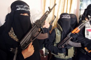 Female Palestinian suicide bombers attend a news conference in Gaza May 21, 2007. The bombers, members of the Al-Aqsa Martyrs Brigades, declared that they are ready to blow themselves up in attacks against the Israeli army if it attacks Gaza. REUTERS/Mohammed Salem (GAZA) - RTR1PXTW