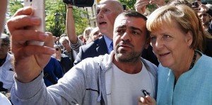 _migrants-angela-merkel-visits-berli-900x444
