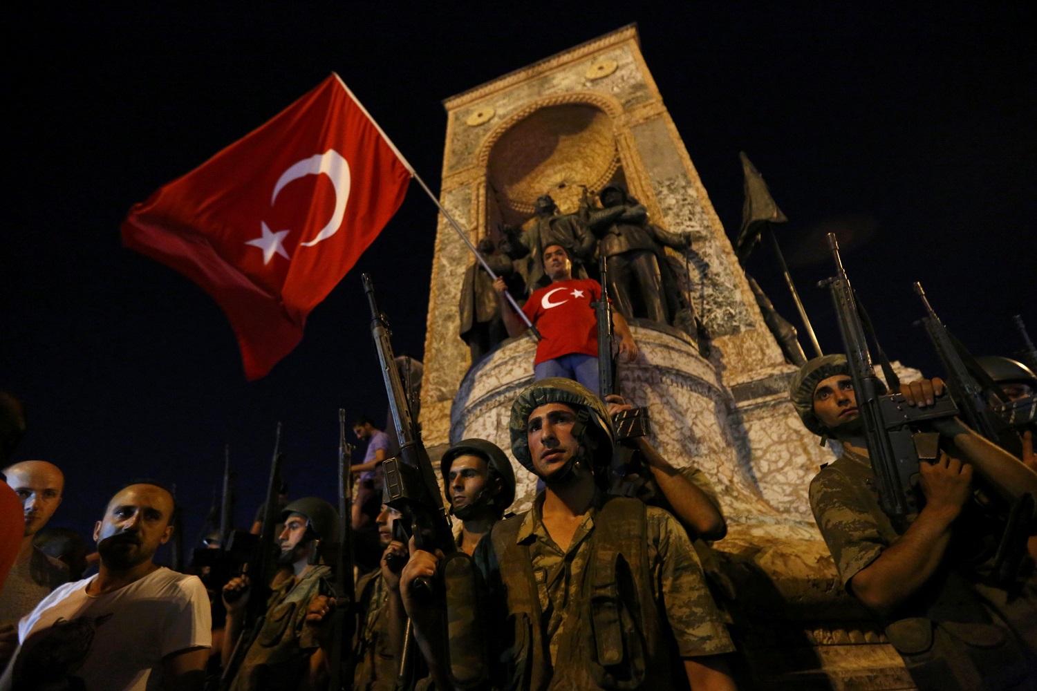 Turkish military stand guard near the the Taksim Square in Istanbul