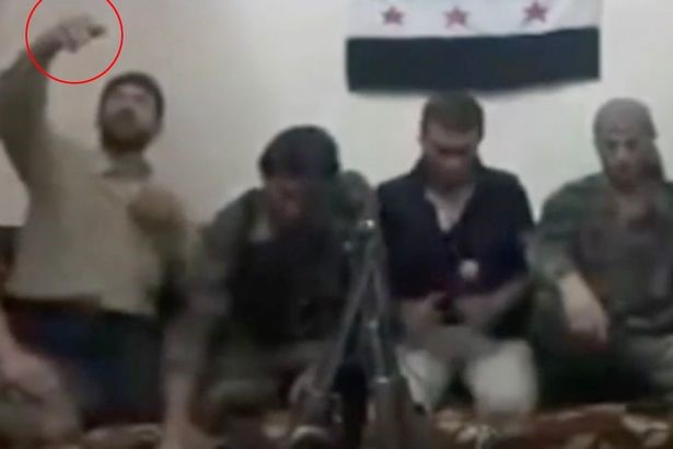Moment Syrian Rebel Blows up himself, Comrades by Using Cellphone Bomb Detonator to Take SELFIE